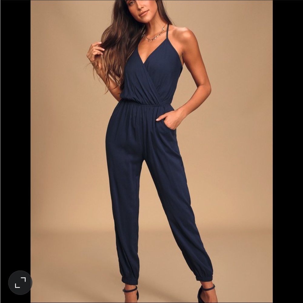 SOLD Lulu’s Learning to Fly Navy Blue Halter Jumpsuit
